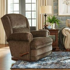 a living room filled with furniture and a rug