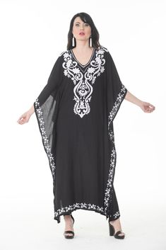 It's a Vacation time, if you are traveling to Europe or some beach location, this is the perfect dress. You can wear it as a dress or like a coverup. It's 100% cotton with hand embroidered. Bohemian V-neck Kaftan With Intricate Embroidery, Festival Embroidered V-neck Kaftan, Embroidered V-neck Summer Kaftan, Traveling To Europe, Black Flowy Maxi-length Kaftan, Black Printed V-neck Kaftan, Beach Location, Kaftan Dress, Dress Clothes For Women