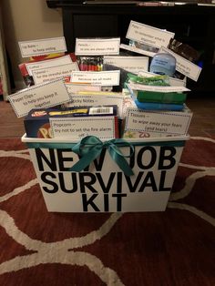 a new job survival kit sits on the floor in front of a tv and bookshelf