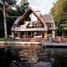 a large house sitting on top of a lake