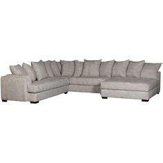 a large sectional couch with pillows on the top and bottom corner, in grey linen