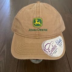 John Deere Hat Brand New Never Been Used Still With Tags A Nice Hat To Have For The Summer Make Up Resistance And Sweat Band Country Style Baseball Cap For Spring, Country Style Spring Baseball Cap, Spring Country Style Baseball Cap, Country Style Cap For Spring, Casual Wide Brim Baseball Cap For Spring, Spring Brown Baseball Cap With Curved Brim, Brown Curved Brim Baseball Cap For Spring, Casual Brown Baseball Cap For Spring, Brown Spring Baseball Cap For Outdoor