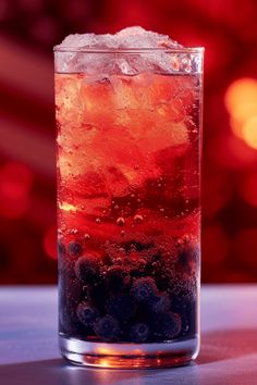 A refreshing Stars and Stripes cocktail recipe featuring blueberries, lemon juice, and absinthe, ideal for summer gatherings. This pin uses 1 image. Red White And Blue Drinks, Star Cocktail, Patriotic Cocktails, Red White And Blue Stars, Blue Drinks, Cocktail List, Festive Cocktails, Betsy Ross