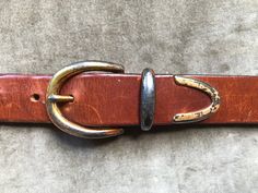 Charter Club. thick cut italian leather. Made in USA. Size Large. Good gently worn condition; shows areas of wear. Fits approx 31.5"-35.5" waist range on 5 notches. Recommended for 31"-35".  1.25" wide. total length: 40" Vintage Brown Leather Belt Buckles, Vintage Brown Belt With Leather Strap, Retro Vintage Brown Leather Belt, Vintage Brown Belt With Rivets, Vintage Brown Hand-tooled Belt Buckle, Suspender Belt, Suspenders, Italian Leather, Heavy Duty