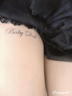 the back of a woman's thigh with words written on it and an inscription that reads, baby bish