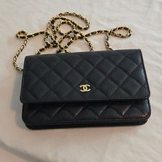 Authentic Black Chanel Caviar Quilted Wallet On Chain Woc. Excellent Condition. Make Me An Offer!! I Am The Second Owner Of This Bag. My Boss Bought It In Paris. She Wore It Once. I Have The Box And Dust Bag. I Will Include It. Size Base Length: 7.5 In Height: 4.75 In Width: 1.75 In Drop: 24.5 In . Classic Formal Wallet With Chain Strap, Chic Evening Wallet With Chain, Classic Chain Wallet For Formal Occasions, Classic Chain Wallets For Formal Occasions, Formal Rectangular Wallets With Chain, Formal Rectangular Wallet With Chain, Classic Gold Wallet On Chain For Formal Events, Classic Gold Wallet On Chain For Formal Occasion, Elegant Gold Wallet On Chain For Business