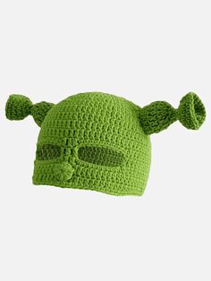 a green crocheted hat with an ear shaped like a monster's head