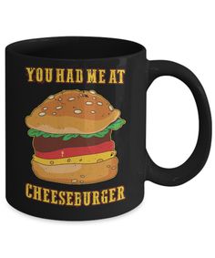 a black coffee mug that says you had meat cheeseburger