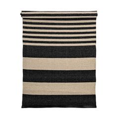 a black and white striped rug on a white background