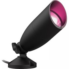 a bright pink light is on the side of a black lamp that's on top of a stand