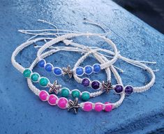 These anklets are the perfect thing to complete your swimsuit.  They are made with durable cotton cord that is perfect to swim with.  The colors all scream summer vibes and that starfish charm just lets everyone know you are in summer mode.  You can choose between an anklet size or a bracelet size. And why not get both so that you can use the matching set.  Get one in every color...I cant choose which one is my favorite! *Anklet Length (13 in) *Bracelet Length (10 in) Proper Sizing: Wrap a strin Adjustable Strand Anklets In Beachy Style, Adjustable Strand Beachy Anklets, Casual Adjustable Anklet For Beach Season, Adjustable Beaded Beachy Anklets, Beachy Friendship Bracelets For Beach Festival, Beach Anklets With Adjustable Length, Summer Beaded Bracelets With Adjustable Length, Adjustable Length Friendship Bracelets For Beach, Casual Summer Braided Strand Bracelets