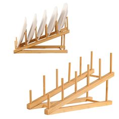 two wooden racks with white plates on them