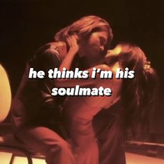 a man and woman sitting next to each other with the words he thinks i'm his soulmate