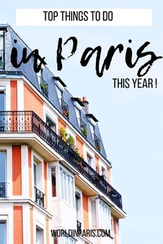 an orange and white building with the words top things to do in paris this year