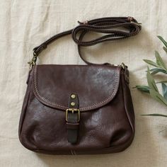 Cheap Vintage Natural Color Shoulder Bag, Cheap Light Brown Crossbody Bag, Brown Saddle Bag For Daily Use In Fall, Everyday Brown Saddle Bag With Phone Pocket, Brown Crossbody Saddle Bag With Cell Phone Pocket, Brown Satchel With Pockets For Fall, Brown Fall Satchel With Pockets, Brown Shoulder Bag With Cell Phone Pocket For Fall, Brown Saddle Bag With Removable Pouch For Fall