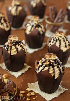 chocolate covered desserts with nuts and drizzled on top