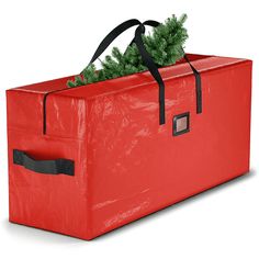 a red bag with a christmas tree in it