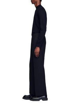 Wide-leg jersey trousers with an elasticated waist and pockets on the sides. Sandro Men's wide-leg trousers elasticated waist Side pockets The model is 6'1 tall and wears a size 40 Fall Workwear Pants With Elastic Cuffs, Elastic Cuffs Workwear Pants For Fall, Elastic Cuffs Work Pants For Fall, Workwear Trousers With Elastic Cuffs, Black Wide-leg Pants With Elastic Cuffs, Wide-leg Bottoms With Elastic Cuffs For Workwear, Black Wide Leg Pants With Elastic Cuffs, Elastic Cuff Trousers For Work, Wide Leg Bottoms With Elastic Cuffs For Work