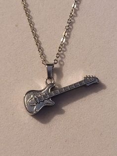 Monkey Jewelry, Guitar Necklace, Spiderman Outfit, Guitar Pendant, Silver Guitar, Human Remains, Pretty Jewelry Necklaces, Urn Necklace, Jewelry Accessories Ideas