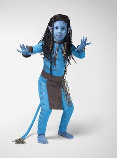 a blue man with dreadlocks standing in front of a white background and holding his hands out