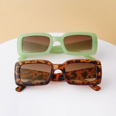 Sunglasses might be a small accessory, but they have a large impact. These trendy sunnies will not only elevate your outfit and your style, but the will definitely boost your mood too. Material: Plastic. Trendy Rectangular Sunglasses For Vacation, Trendy Rectangular Sunglasses With Mirrored Lenses, Trendy Green Sunglasses For Summer, Retro Green Sunglasses For Vacation, Retro Square Frame Sunglasses For Beach, Rectangular Sunglasses With Uv Protection For Spring, Green Sunglasses For Beach, Trendy Rectangular Sunglasses With Tinted Lenses, Green Sunglasses For Spring Vacation