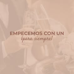 two people holding champagne glasses with the words empecemos con un jpara sempre