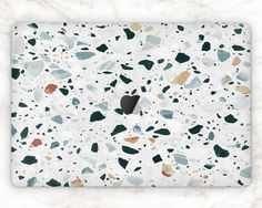 an abstract background with black and white speckles