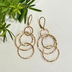 * Gold Interlocking Circle Leverback Earrings, Handmade Hammered 14K Gold fill Multi Hoop Dangle Leverback Earrings, Gift for Her, Birthday, Mothers Day Gift * lightweight, easy to wear interlocking hoop earrings * 18 gauge 14K Gold fill wire * hand forged, handcrafted earrings * Ready to ship in 1-4 days More gold earrings here: http://etsy.me/3a1FeKe More interlocking hoops here: http://etsy.me/35DVpvW More sterling silver earrings here: http://etsy.me/3ss3wWv More mixed metal earrings here: h Earrings Gold Hoops, Mixed Metal Earrings, Link Earrings, Gift For Her Birthday, Hammered Gold, Leverback Earrings, Handcrafted Earrings, Gold Earrings Dangle, Metal Earrings