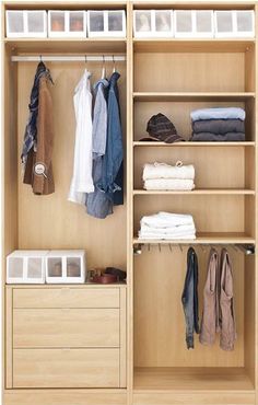 an open closet with clothes and other items