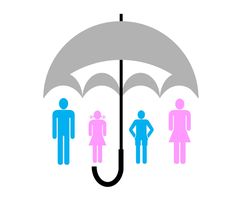 people standing under an umbrella in the rain