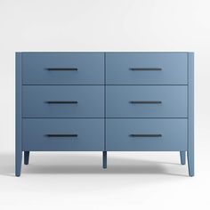 a blue dresser with black handles and drawers