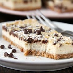 a piece of cheesecake with chocolate chips on top