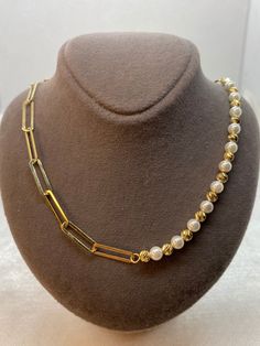 "18k real Gold paper clip necklace   with cultured pearls  ,19\" \",4mm, 7.27 gr(weight of gold only) 18k real Gold paper clip  bracelet with cultured pearls  ,7.2\",4mm, 3.27 gr(weight of gold only) please be advised that the necklace is semi hollow but strong enough to wear it everyday and also half of the necklace is paperclip and the other half is paperclip and orb diamond cut mixed with pearl . Priced to sell! Compare our prices to other similar sellers! Arrives in a GIFT BOX and includes F Pearl Necklace With Paperclip Chain, Gold Pearl Necklace With Paperclip Chain, White Pearl Necklace With Paperclip Chain, Gold Paper Clip Necklace, Gold Paperclip Necklace, Paper Clip Bracelet, Paper Clip Necklace, Necklace With Pearl, Paperclip Necklace