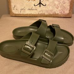 New - Never Worn - Birkenstock Arizona Eva Sandals In Army Green . No Original Box - Size 43 Green Footbed Sandals With Round Toe For Vacation, Green Round Toe Footbed Sandals For Vacation, Green Slip-on Casual Footbed Sandals, Casual Green Footbed Sandals With Textured Footbed, Green Buckle Closure Sandals For Beach, Green Beach Sandals With Buckle Closure, Casual Green Sandals With Buckle Closure, Green Casual Flat Footbed Sandals, Casual Green Flat Footbed Sandals