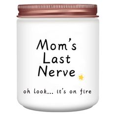 a white jar with the words mom's last nerve on it