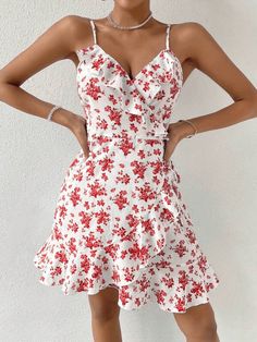 This beautiful WYWH Floral Print Ruffle Trim Wrap Knot Side Cami Dress is the perfect addition to your summer wardrobe. Its lightweight and flowy fit is crafted from 95% Polyester and 5% Elastane fabric, with fresh all-over floral print accents and ruffle and wrap detail that add a touch of boho-chic to your look. The sleeveless spaghetti strap dress features a high waist and regular fit, perfect for twirling in the sunshine. Style: Boho Pattern Type: Floral, All Over Print Details: Ruffle, Wrap Flirty V-neck Floral Dress For The Beach, White V-neck Ruffle Dress For Day Out, Summer Chiffon Dress With Ruffled Straps, Summer Chiffon Dresses With Ruffles, Summer V-neck Ruffle Dress For Garden Party, Flirty V-neck Ruffle Dress For Summer, Chiffon Summer Dress With Ruffled Straps, Chiffon Mini Dress With Ruffle Hem For Beach, Beach Chiffon Mini Dress With Ruffle Hem