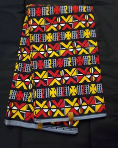 DESCRIPTION Black, Yellow and Red Multicolor African Ankara Fabric. This is high quality African print is 100% cotton and it's 45 inches wide. It is used for making African Clothing, African quilts, & For Home decoration. FYI: Print is Double sided. The listing is for 2yards, 3yards, 6yards and Headwrap Each piece of fabric measures: 70-72in by 45in for 2yards 105-108in by 45in for 3yards 210-216in by 45in for 6yards 70in by 22in for Head wrap If you purchase more than one yard, you will receive one continuous piece. *If you require more than what I have listed, feel free to send me email. CARE INSTRUCTIONS:•DO NOT BLEACH•Hand wash with cold water and mild soap or Dry clean•Press with warm iron on the wrong side only. Color may be different due to your monitor Traditional Patterned Cotton Fabric For Festivals, Red Traditional Block Print Fabric, Red Fabric With Unique Traditional Pattern, Traditional Red Block Print Fabric, Black Printed Cotton Patterns, Traditional Cotton With Colorful Pattern, Traditional Cotton Patterns With Colorful Design, Multicolor Cotton Fabric For Festivals, Black Cotton Fabric With Colorful Pattern