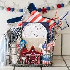 a basket filled with patriotic items on top of a tiled floor