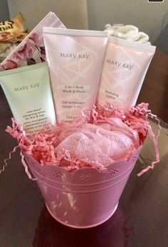 a pink bucket filled with personal care items