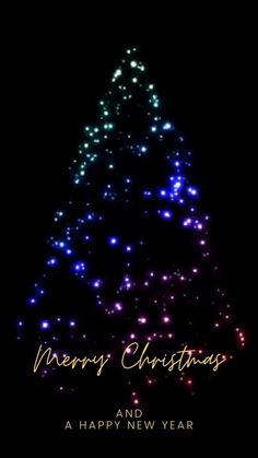 a christmas tree with lights on it and the words merry christmas and a happy new year