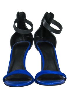 Get ready to be showered with compliments when wearing these vibrant open toe heels from Joie! The show stopping cobalt color will catch the eyes of every person that you strut past. They can be styled with a matching dress for a fancy dinner date with your special person. Size 6.5 (EU 37.5) Dust bag included Minimal wear on bottom sole Exposed silver-toned zipper at heel Heel height 4" Royal Blue Evening Heels For Summer, Chic Blue Sandals For Night Out, Blue Heels With Padded Heel For Night Out, Blue Open Toe Heels With Heel Loop, Royal Blue Open Toe Heels, Blue Round Toe Sandals For Night Out, Blue Sandals With Round Toe For Night Out, Blue Open Heel Evening Sandals, Blue Open Heel Sandals For Evening