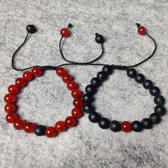 ADJUSTABLE Distance Bracelets Set - Black & Red Onyx Matching Pair - Long Distance - For Friendships/relationships/couples - Gemstone Bracelet. Product details: Bracelet type: bead Material: Black Onyx & Red Onyx Color: Black & Red Band type: Thread Dimensions: Bead size: 8mm Bracelet length: 6-8 Inches (Slide design made to fit wrists of all sizes! One size fits all.) Weight: 17 gm (Approx.) 1. Choose between ordering a set or single bracelets above! This allows you to send the different colors Unique Matching Bracelets, Adjustable Red Crystal Bracelet With Gemstone Beads, Red Round Beads Bracelets For Friendship, Adjustable Red Beaded Gemstone Bracelets, Red Adjustable Gemstone Beaded Bracelets, Adjustable Red Gemstone Beaded Bracelets, Adjustable Hand-strung Red Wristband, Adjustable Red Bracelets With Round Beads, Adjustable Red Round Bead Bracelets