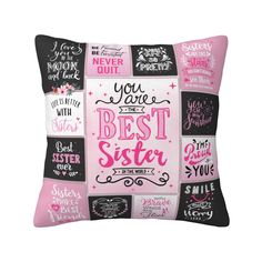 pink and black pillow with the words you're best sister in different languages on it