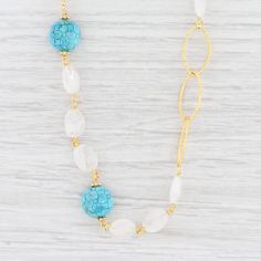 "This lovely new necklace is an authentic Nina Nguyen piece. This necklace has a retail price of $395. Gem: Natural Turquoise, Druzy Quartz Metal: Sterling Silver, 22k Gold Vermeil Weight: 35.5 Grams Stamps: Nina N 925 Style: Cable Chain, Linked Turquoise Closure: Lobster Clasp Chain Length: 45\" Adjustable Width: 12.2 - 11.1 mm Each piece is thoroughly examined and refinished as needed by our professional jewelers, graded by our in-house GIA (Gemological Institute of America) Graduate Gemologis Elegant Turquoise Necklace With Lobster Clasp, Artisan Turquoise Beaded Chain Necklace, Elegant Beaded Turquoise Necklace, Elegant Long Beaded Turquoise Necklace, Druzy Quartz, Recycled Jewelry, Greensboro Nc, Message Jewelry, Natural Turquoise