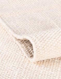 the textured fabric is white and beige