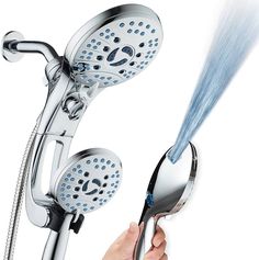 a person is holding a shower head with blue water coming out of it and spraying the faucet