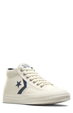 A 1970s icon gets a modern refresh in a classic mid-top sneaker that's topped with sturdy canvas and layered on the sides with minimalist logo details. Lace-up style Removable OrthoLite® insole Textile upper and lining/rubber sole Imported Converse High-top Canvas Sneakers With Gum Sole, Retro Canvas High-top Sneakers With Rubber Toe Cap, Sporty High-top Sneakers With Canvas Lining, Converse Canvas High-top Sneakers With Contrast Sole, Retro Mid-top Canvas Shoes With Rubber Sole, Retro High-top Canvas Sneakers With Gum Sole, Retro Canvas Sneakers With Rubber Toe Cap, Converse Retro Cotton High-top Sneakers, Retro Converse Mid-top Sneakers