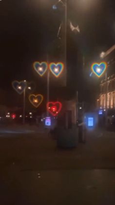 the street lights are lit up with hearts