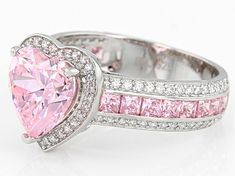 Pre-Owned Bella Luce ® pink and white diamond simulants 6.66ctw heart, square, and round, rhodium over sterling silver heart ring. Measures approximately 0.81"L x 0.44"W and is not sizeable. The diamond equivalent weight is 3.80ctw..  This product may be a customer return, vendor sample, or on-air display and is not in its originally manufactured condition.  It may not be new.  In some instances, these items are repackaged by JTV. Pink Jewelry Rings, Pink Heart Diamond Ring, Pink Diamond Ring With Prong Setting For Valentine's Day, Pink Diamond Jewelry With Prong Setting, Valentine's Day Pink Diamond Ring With Prong Setting, Pink Round Cut Ring For Valentine's Day, Pink Round Cut Rings For Valentine's Day, Valentine's Day Pink Cubic Zirconia Diamond Ring, Pink Prong Setting Jewelry For Anniversary