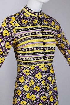 "1960s mod slinky Nylon long sleeve dress in a bold color combo of yellow, black, white, and purple Super cool trippy checkered floral print Lightweight and slippery micro ribbed Nylon, some stretch, not much Black rounded dome buttons and loops open the bodice to the waist Fitted bodice with darts A-line skirt that falls close to the body in layers and hits around the knee Unlined Union made in the USA Hand washed and ready to wear - no damage - excellent vintage in every way Be the bold babe y 1960s Mod, 60s Mod, Women Long Sleeve Dress, Vintage Style Dresses, Wiggle Dress, Bold Color, Yellow Purple, Color Combo, Fitted Bodice